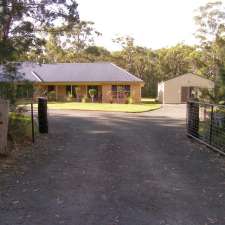 Jervis Bay Cat Cottage | 14 James Farmer Grove, Woollamia NSW 2540, Australia