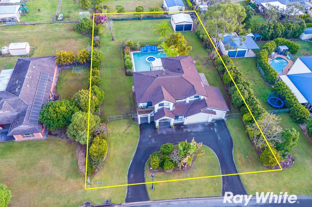 Ray White: Real Estate Agents Murrumba Downs | real estate agency | Murrumba Downs Shopping Centre - Shop 12 Cnr Dohles Rocks Rd &, Goodrich Rd W, Murrumba Downs QLD 4503, Australia | 0734918850 OR +61 7 3491 8850