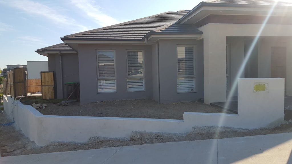 Rock Wall Cement Rendering | general contractor | Elliston St, Chester Hill NSW 2162, Australia | 0403577115 OR +61 403 577 115