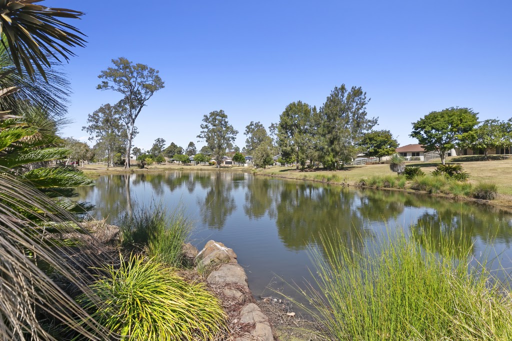 Woolmar Land Sales Centre - QM Properties | 2 Raleigh St, Woolmar QLD 4515, Australia | Phone: (07) 3874 0086