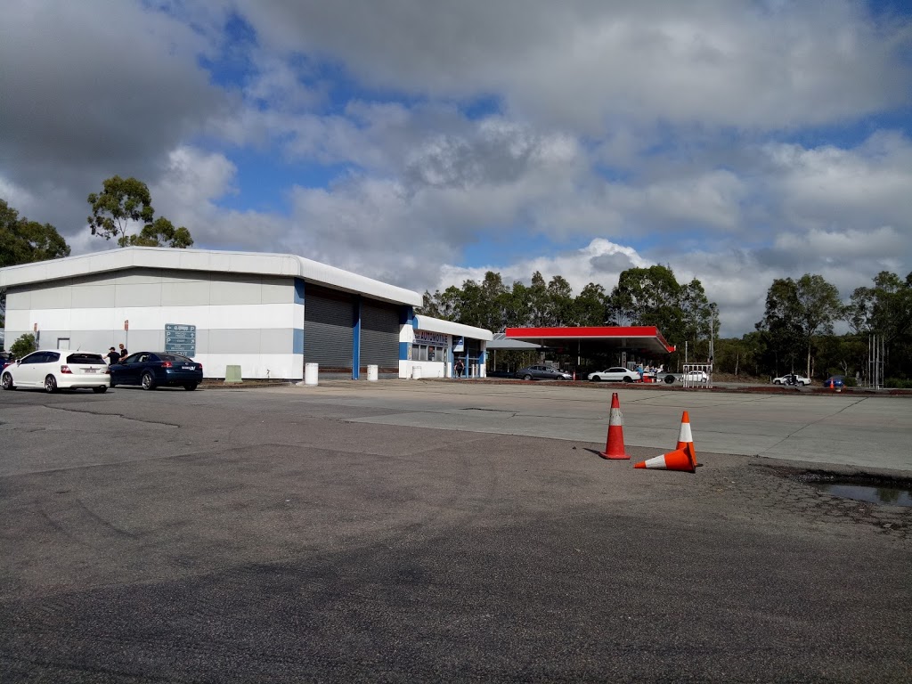 Twin service stations | gas station | 21cc Pacific Mwy, Alison NSW 2259, Australia