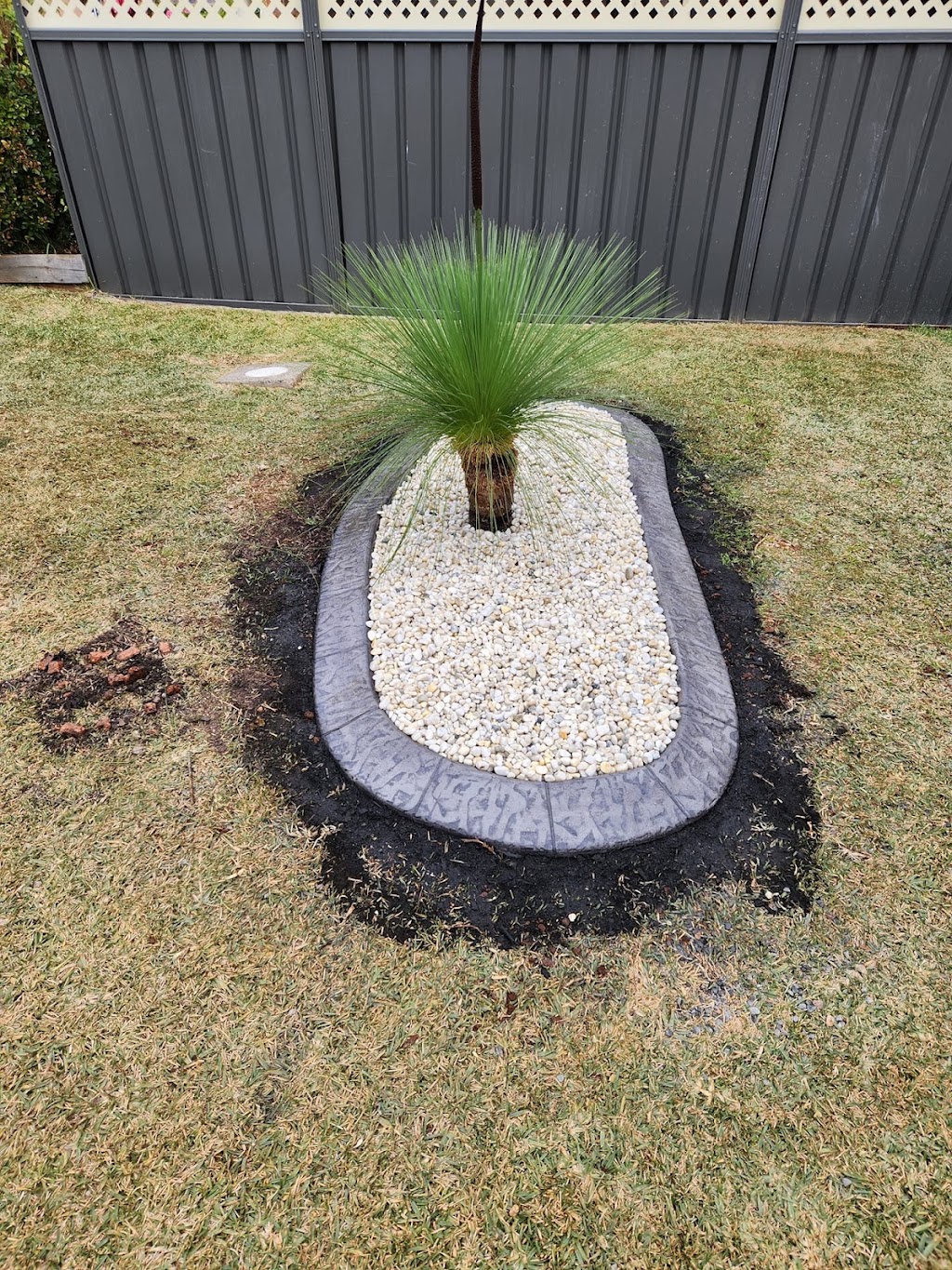 Brett continuous concrete kerbing garden edging | 3 Bottlebrush Pl, Lakewood NSW 2443, Australia | Phone: 0470 018 422