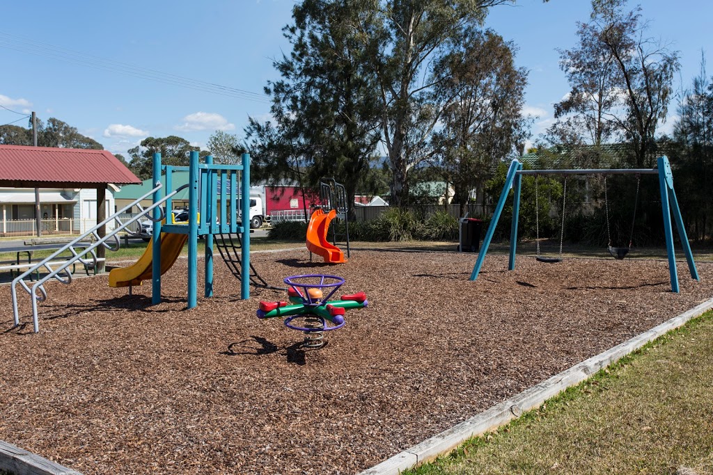 Holmesville Playground |  | 23 George St, Holmesville NSW 2286, Australia | 0249210333 OR +61 2 4921 0333