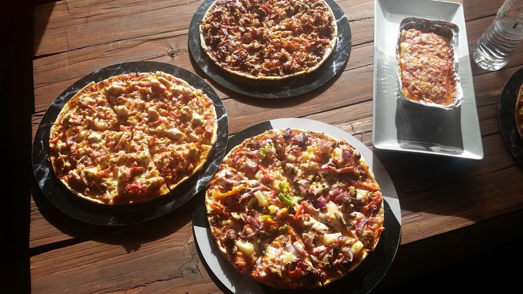 Outlaw Pizza | shop 2/26 Minjungbal Dr, Tweed Heads South NSW 2486, Australia | Phone: (07) 5658 0211